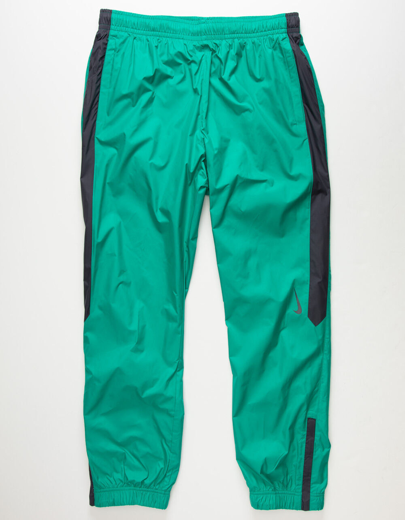 NIKE SB Shield Swoosh Skate Mens Kelly Track Pants image number 1