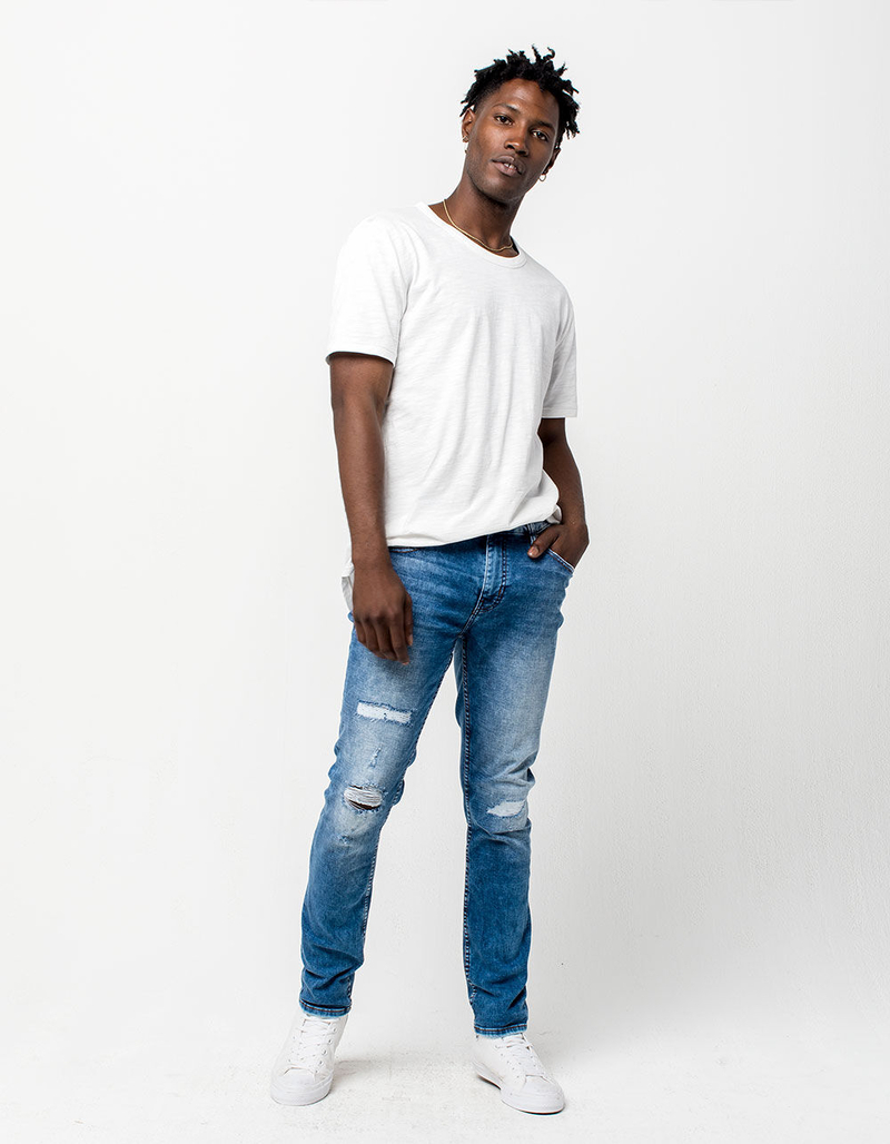 RSQ Seattle Rip N Repair Light Wash Mens Skinny Taper Jeans image number 1