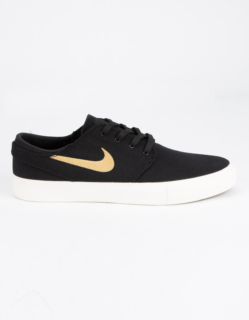 NIKE SB Zoom Stefan Janoski Canvas RM Black & Club Gold Shoes image number 0