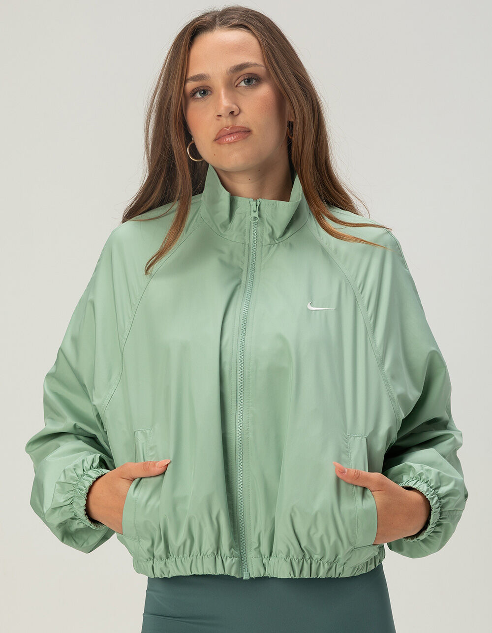 YORT【撥水・UVカット】ナイロントラックジャケット NIKE Sportswear Womens Oversized UV Track Jacket - LT GREEN | Tillys
