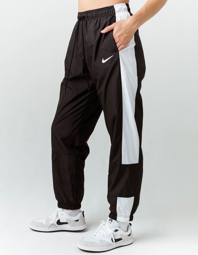NIKE Sportswear Repel Womens Track Pants image number 1