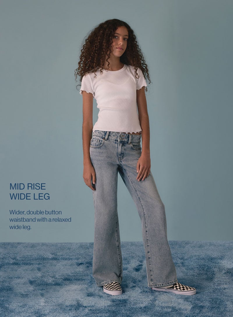 Mid Rise Wide Leg - Wider, double button waistband with a relaxed wide leg.