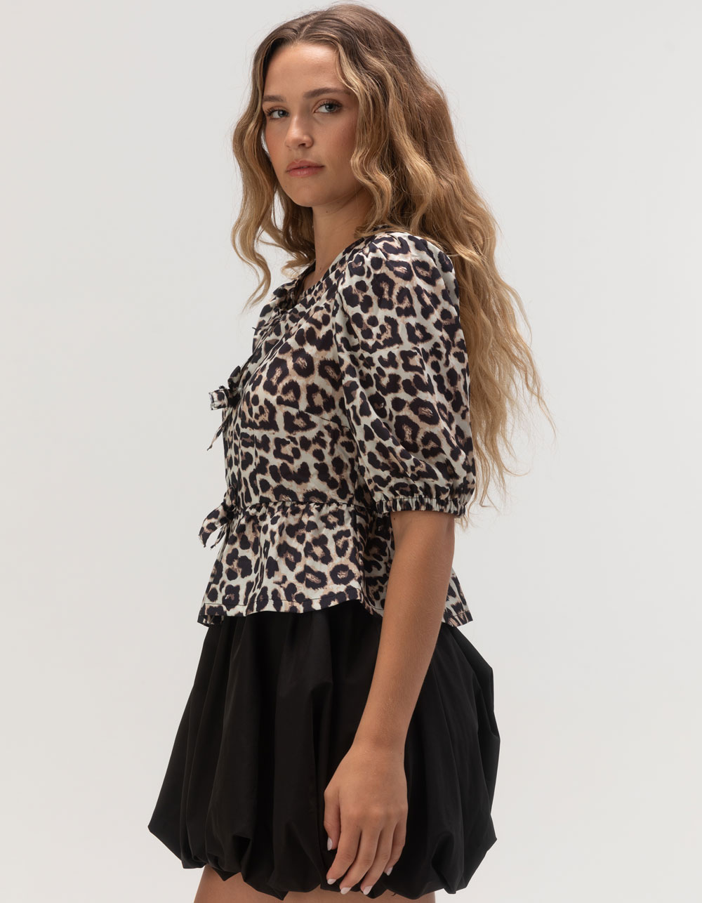 WEST OF MELROSE Womens LEOPARD Bow Peplum Top