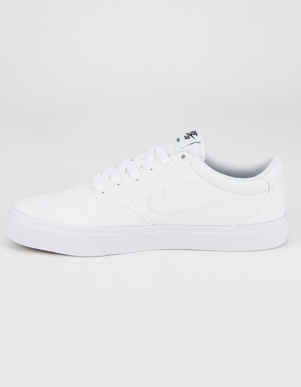 nike sb charge canvas trainers in white