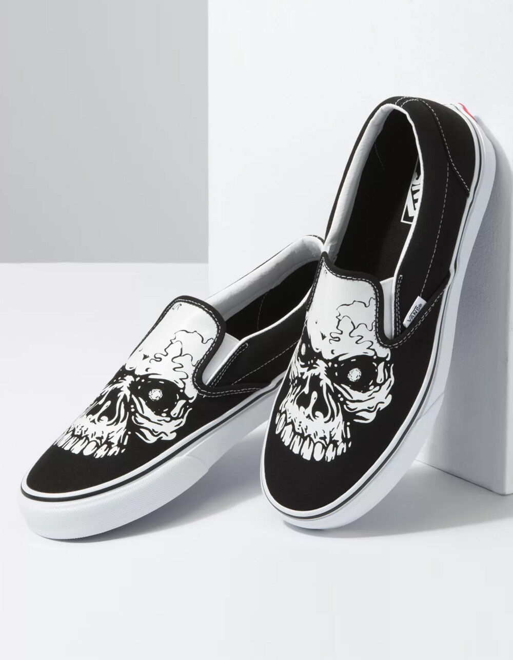 VANS TM Glow Skulls Classic Slip-On Shoes - BLACK/WHITE | Tillys