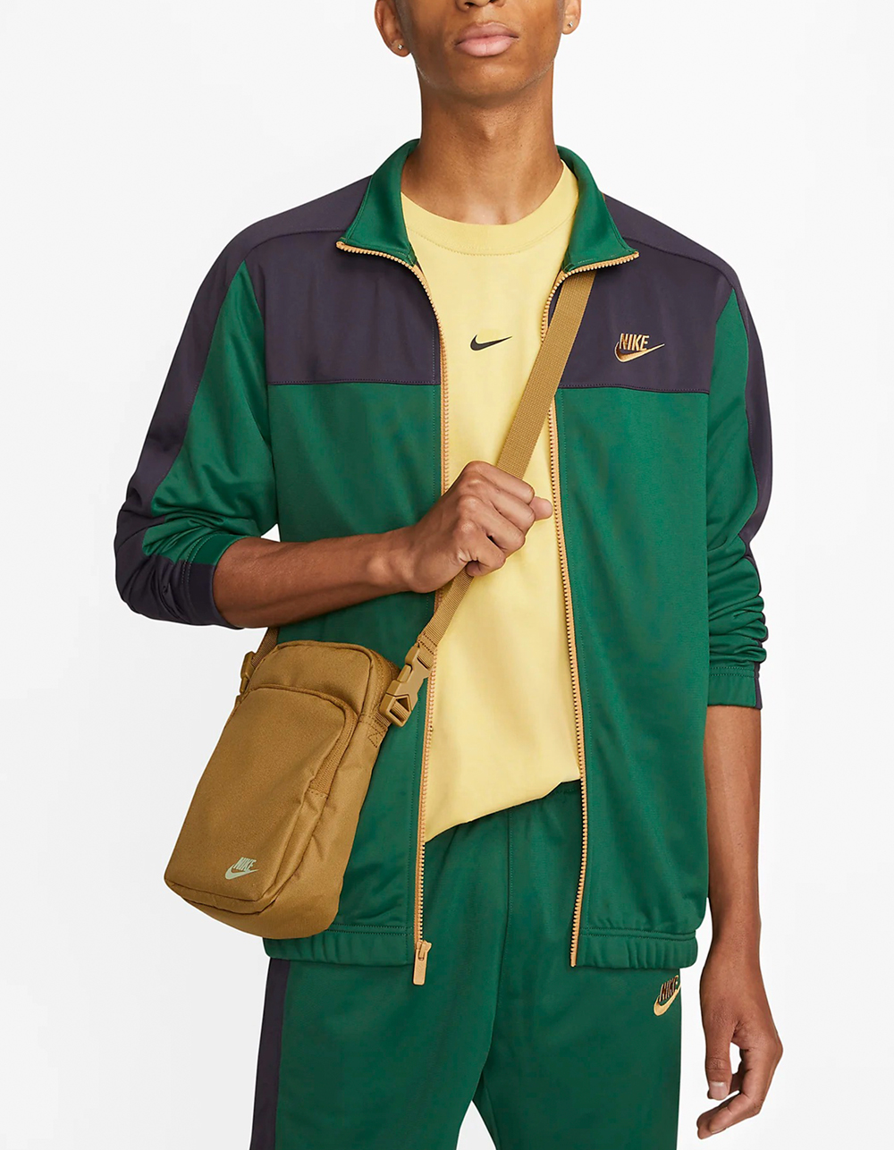 Buy the Nike Nike Heritage bum bag with iridescent logo in khaki on