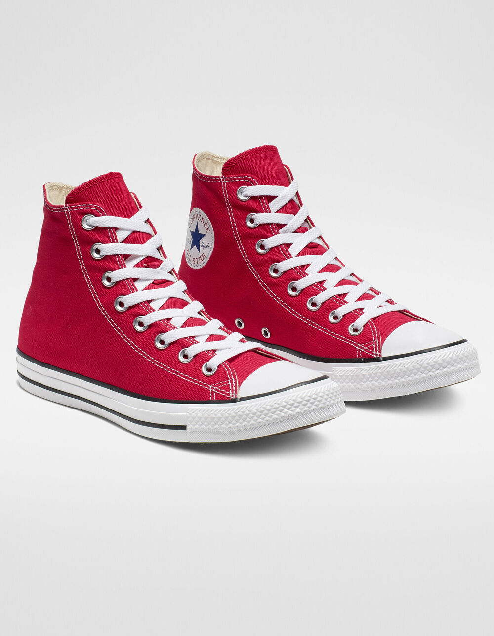 red high top converse tennis shoes