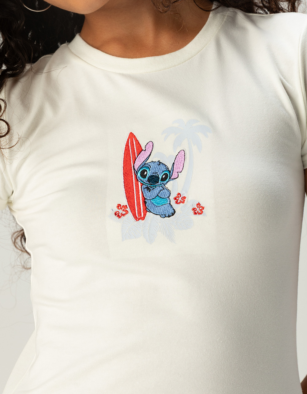 RSQ Disney Stitch Beach Scene Womens Embroidered Baby Tee - CREAM