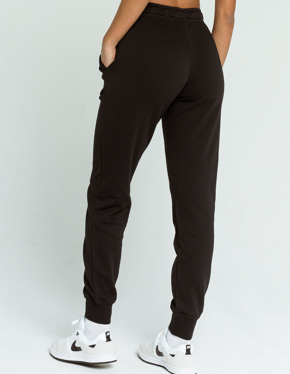 nike black essentials slim joggers womens