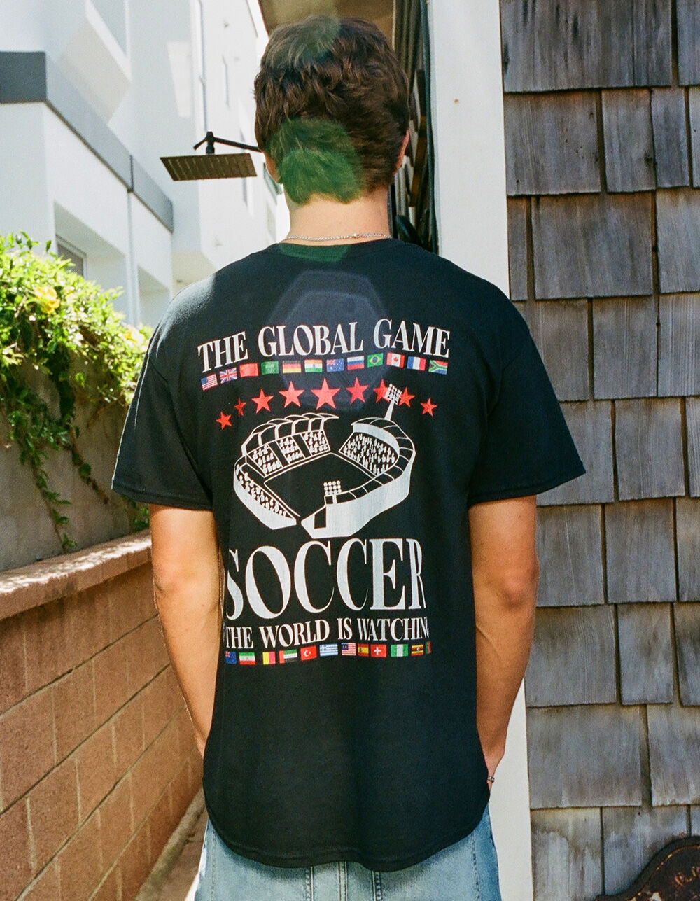 SOCCER World Is Watching Unisex Tee